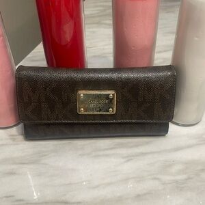 Micheal Kor’s wallet